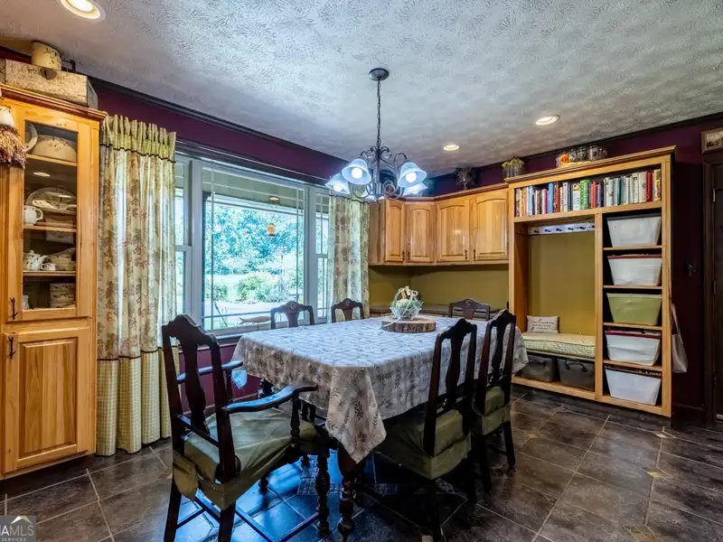 27 Acres with 2,400 Sq. Ft. Home, Duplexes, Pool, and Barn in Prime Location