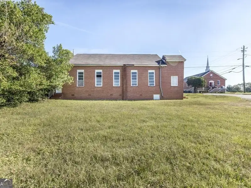 Historic Church Building on Corner Lot in High-traffic East Macon, 0.41 Acres