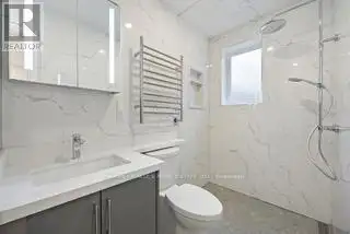 Renovated 2nd Floor Condo in Mid-town Toronto with Luxury Finishes and Modern Amenities