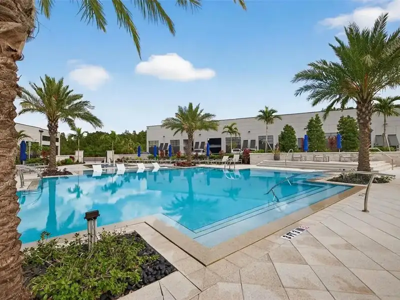 Exclusive Balcony Unit at the Motor Enclave with Private Garage and Racetrack Views