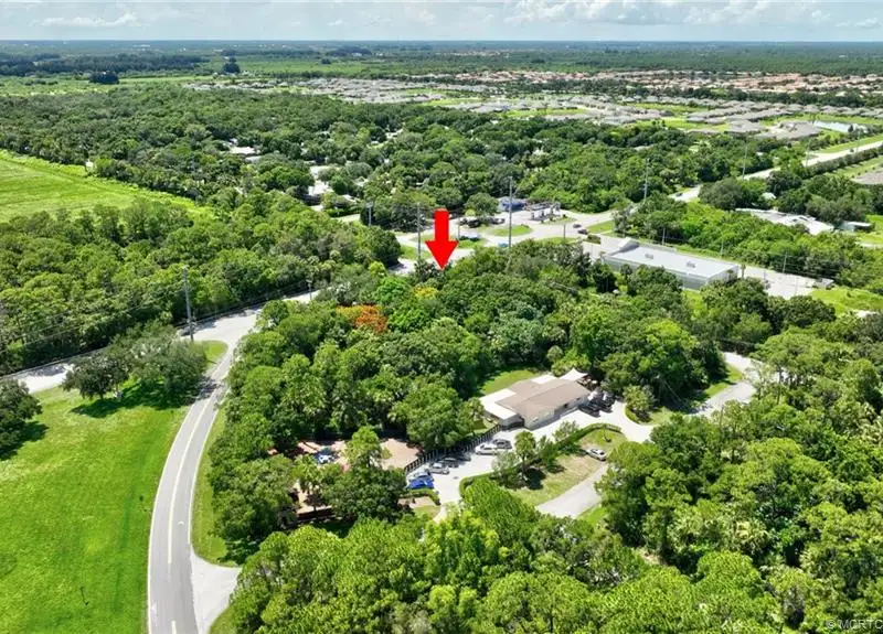 Commercial Corner Lot with Existing Residence in Lakewood Park, 31,140 Sq Ft