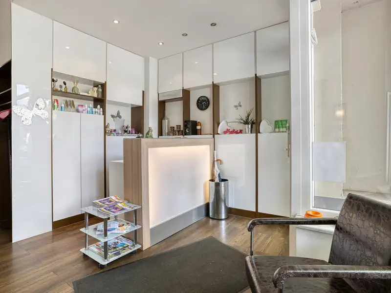 Versatile Ground-level Retail Space with Dual Entrances and Basement Storage