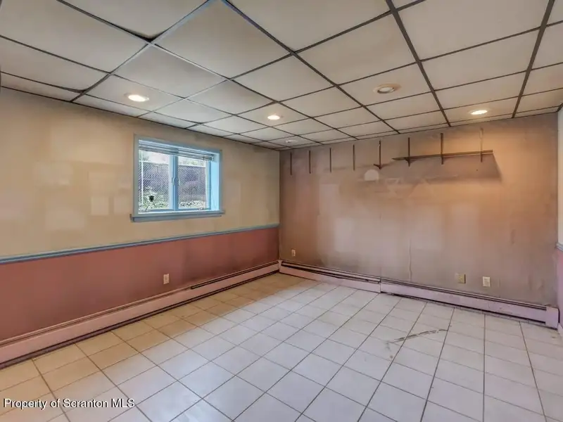 Mixed-use Property in Throop: 7-bay Garage and Updated 2-bedroom Apartment