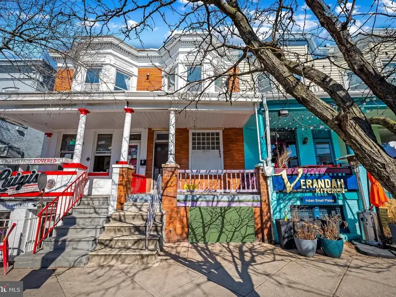 Multi-story Mixed-use Property with Apartment Potential in Prime Location