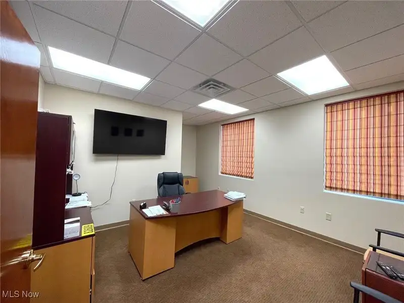 Well-maintained Two-story Brick Building with Retail and Workshop Space in Ne Location