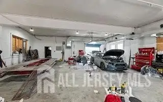 Turnkey Automotive Business with Car Dealership, Mechanic & Auto Body Shop in Prime Location