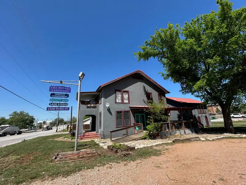 Historic Two-story Commercial Building with Garage Loft Apartment in Prime Location
