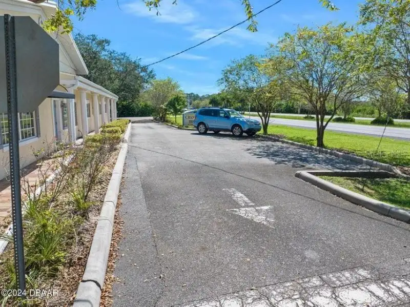 Class a Office Building with River Views in Ormond Beach, Ideal for Dual Businesses