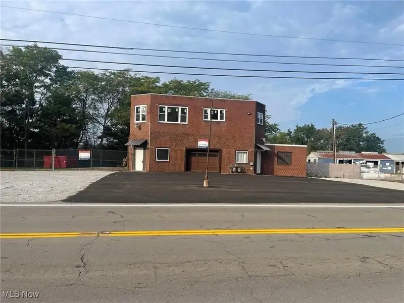 Updated Mixed-use Brick Building with Retail and Office Space in Prime Location