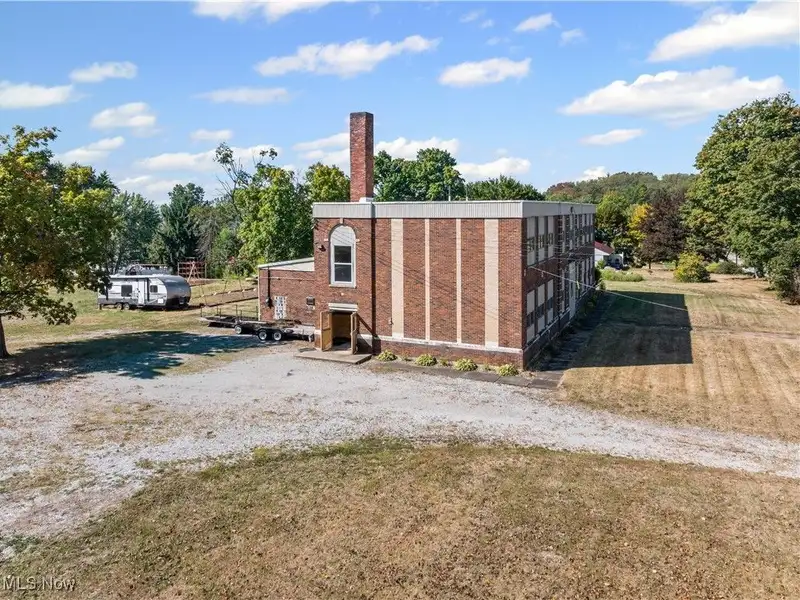 Versatile Two-story Brick Building on Almost 3 Acres with Gym and Classrooms