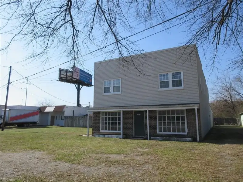 2-story Commercial Building with Office, Warehouse, and Apartments in W Pembroke