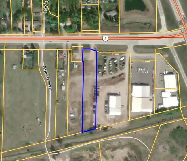 Flexible Development Site with Highway 2 Access and Income-generating Cell Tower