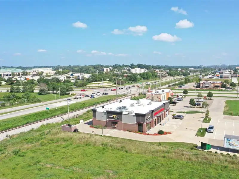 Fully Leased Retail Property with Development Potential Near Coral Ridge Mall