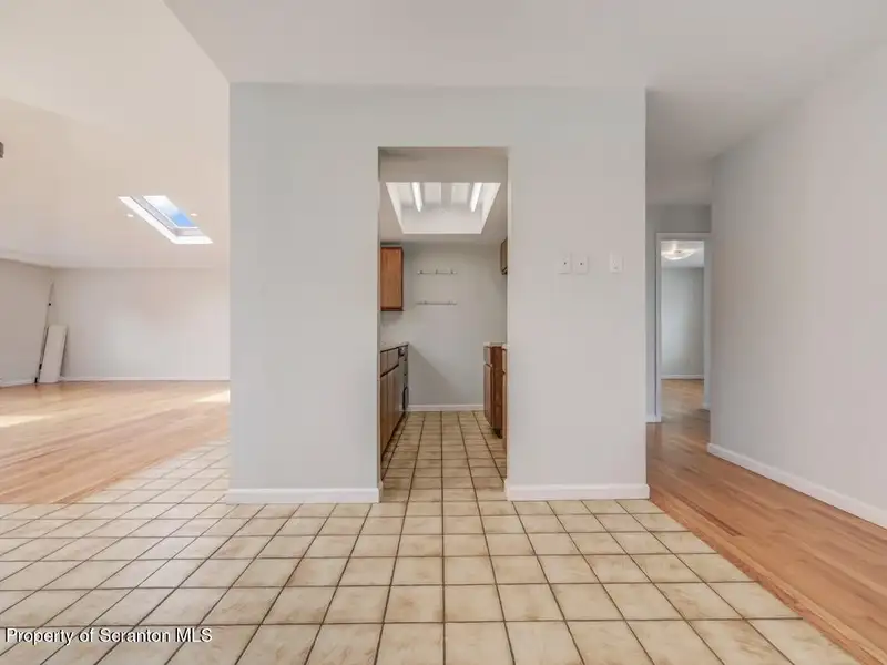 Mixed-use Property in Throop: 7-bay Garage and Updated 2-bedroom Apartment