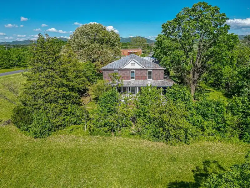 Classic American Foursquare Home in Need of Restoration with Detached Garage