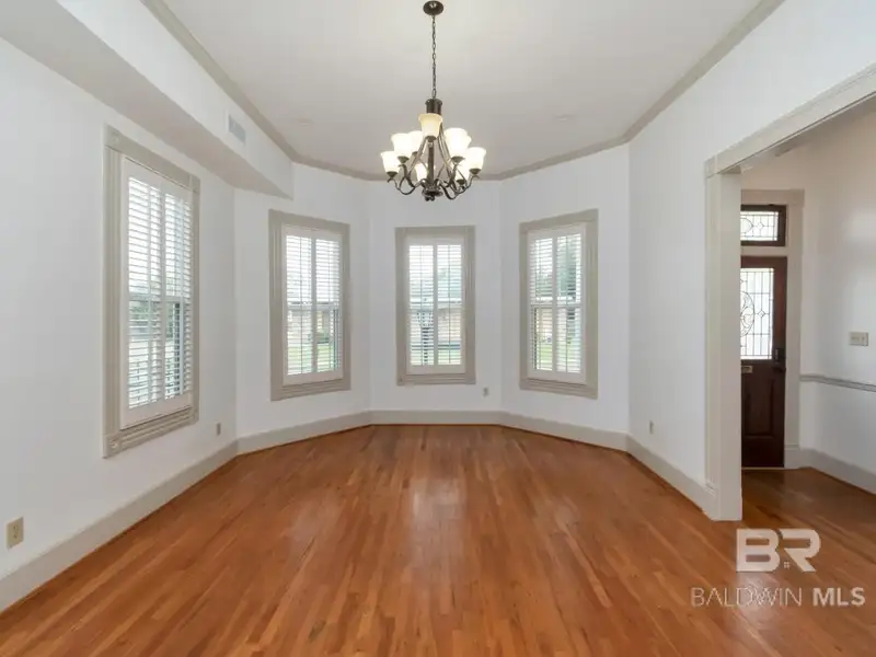 Mixed-use Property in Downtown Mobile, Alabama with High Ceilings and Hardwood Floors