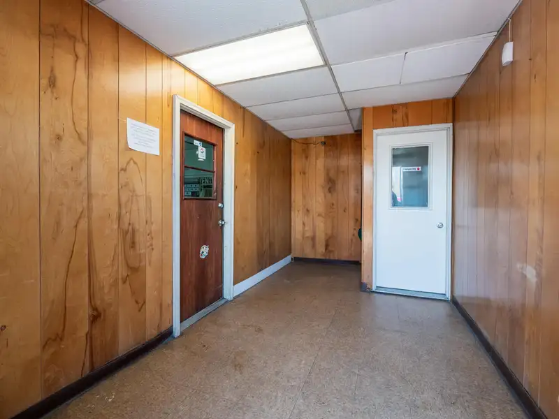 Mixed-use Property with 1-bedroom Apartment in Well-maintained Building