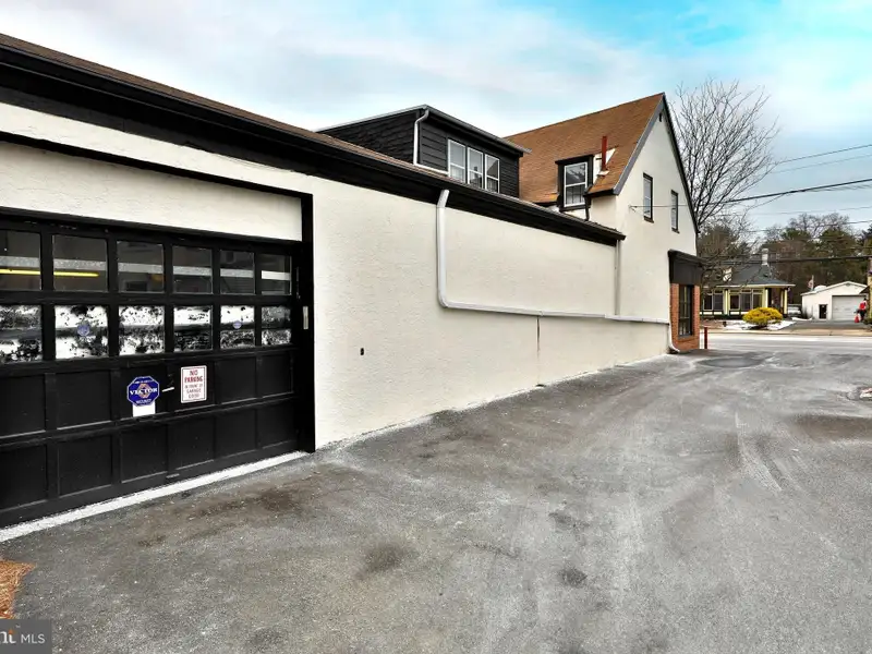 Mixed-use Commercial Property with Office, Garage, and Apartment in Flourtown