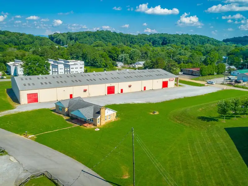Versatile 33,880 Sf Industrial Warehouse with Income-producing Home in Cleveland, Tn