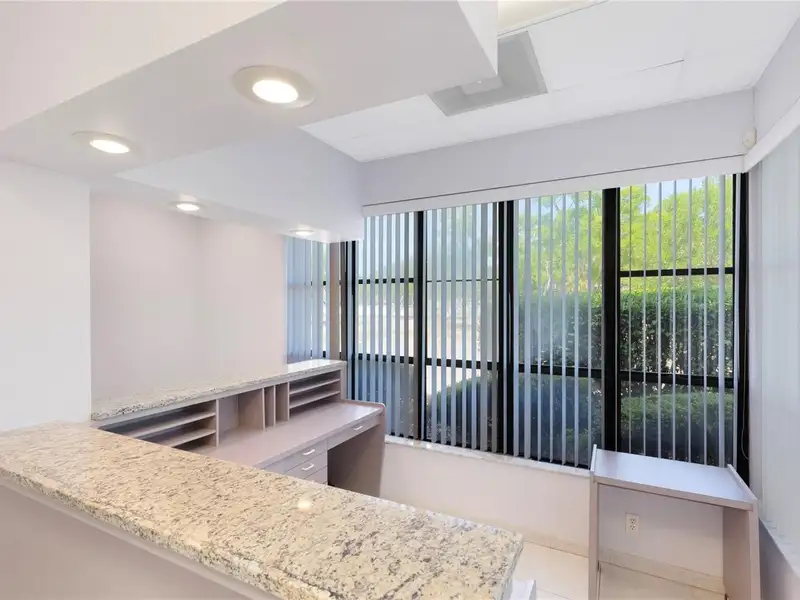 End Unit Tri-plex Commercial Space with Parking in Prime Location