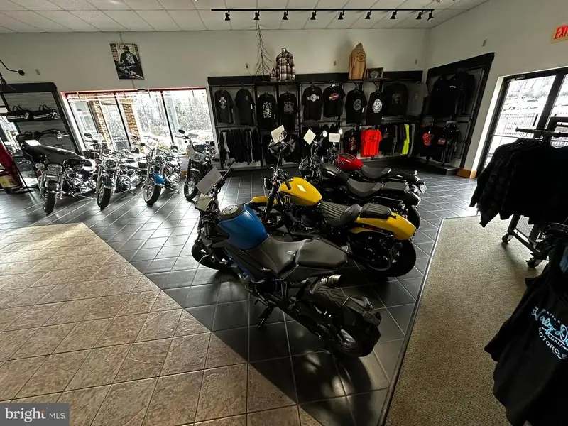 Versatile Commercial Property with Showroom, Offices, and Large Metal Building in Prime Location