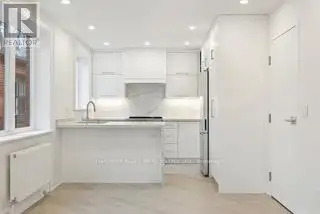 Renovated 2nd Floor Condo in Mid-town Toronto with Luxury Finishes and Modern Amenities