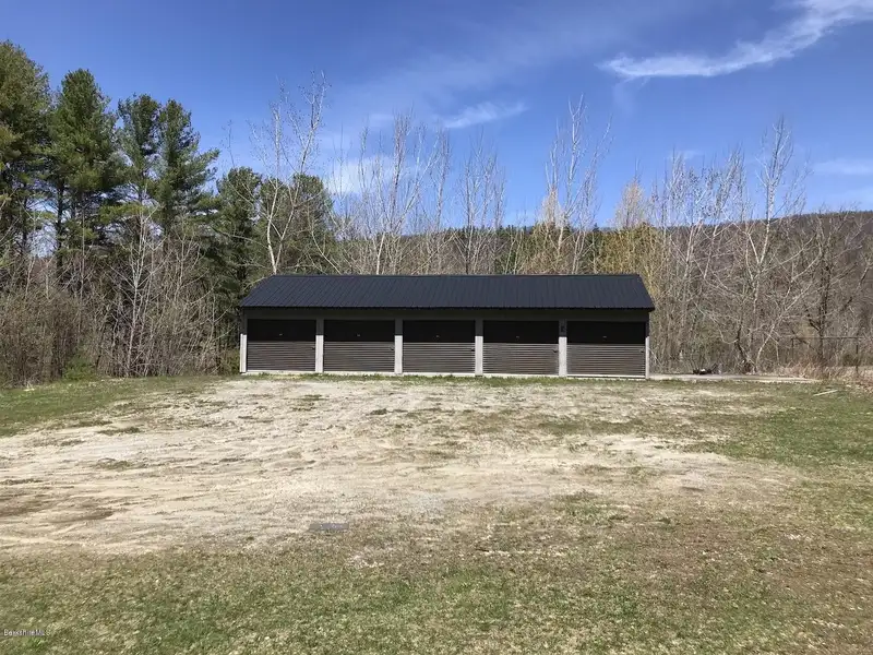 Large Rural Business Parcel with Gravel Pit and Storage Building in Lee, Ma