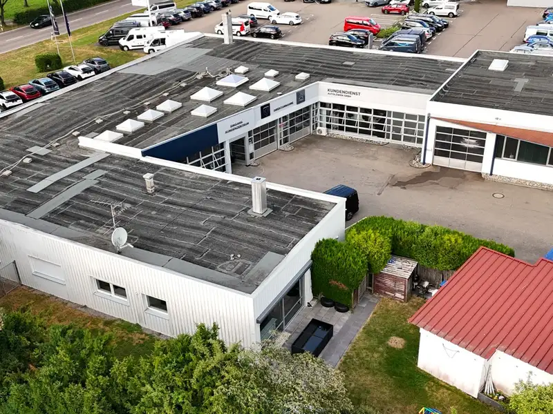 Modern Car Dealership and Service Facility with Residential Space in Schwäbisch Hall
