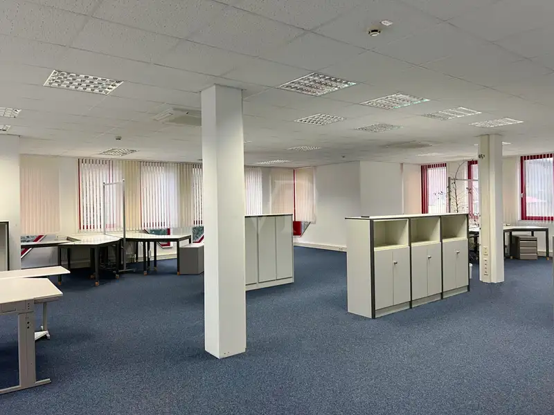 Versatile Company Building with Apartments, Offices, and Storage in Prime Location