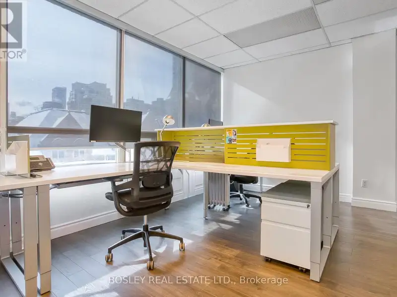Renovated South-facing Office Condo with Views at 130 Carlton St, Toronto