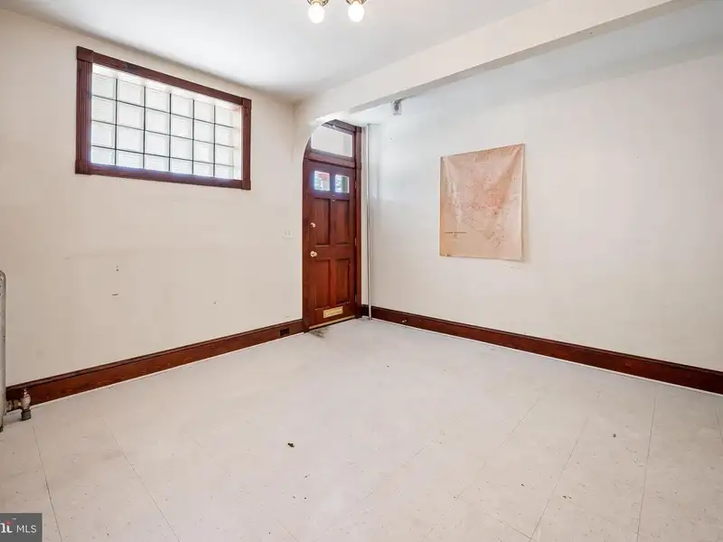 Multi-story Mixed-use Property with Apartment Potential in Prime Location