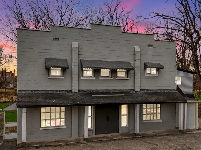 Mixed-use Two Unit Building with Remodeled Three Bedroom Apartment in Prime Location