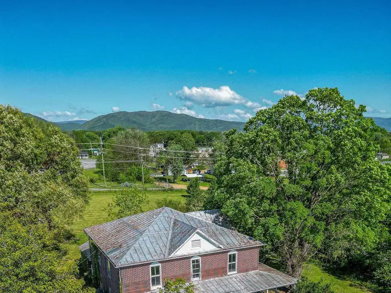 Classic American Foursquare Home in Need of Restoration with Detached Garage