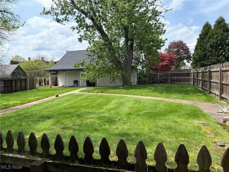 Updated Tudor Office Building with Residential Potential in Canton Near Downtown