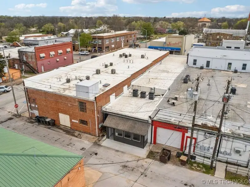 Historic Office Building with 9 Private Suites and Conference Room in Prime Location