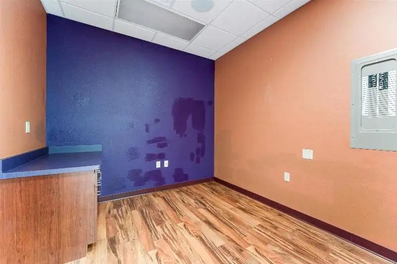 Versatile Commercial Condo for Sale Near Hwy 151 & 41 with Multiple Offices and Amenities