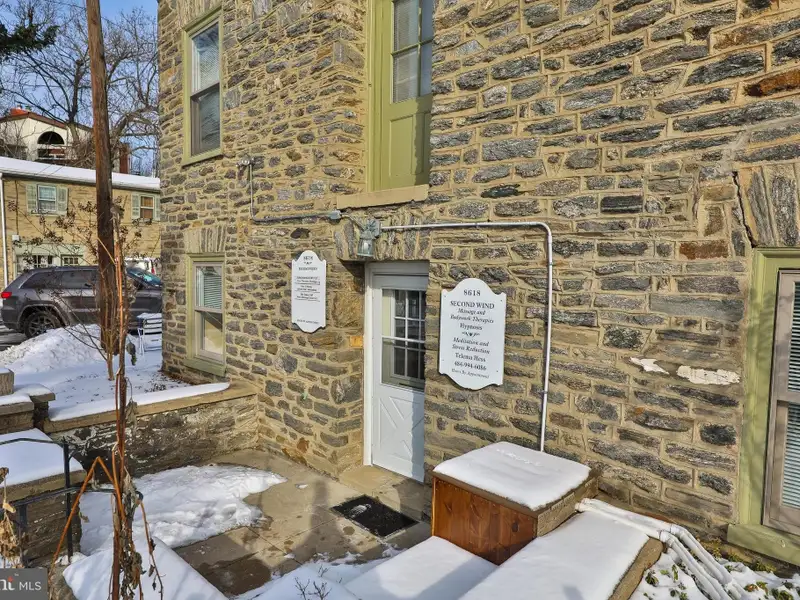 Historic Multi-use Building in Chestnut Hill Business District with Retail and Residential Units