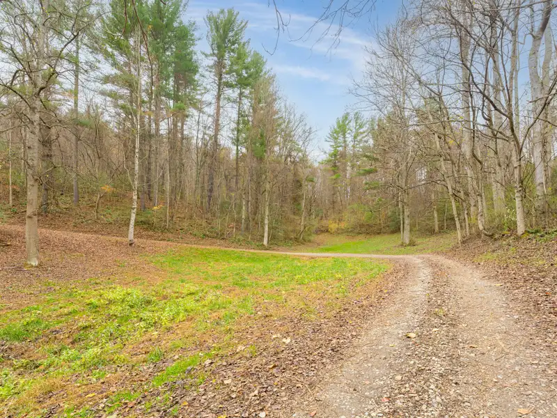 Unique 268-acre Asheville Property with Mountain Views, Homestead, and Horse Facilities