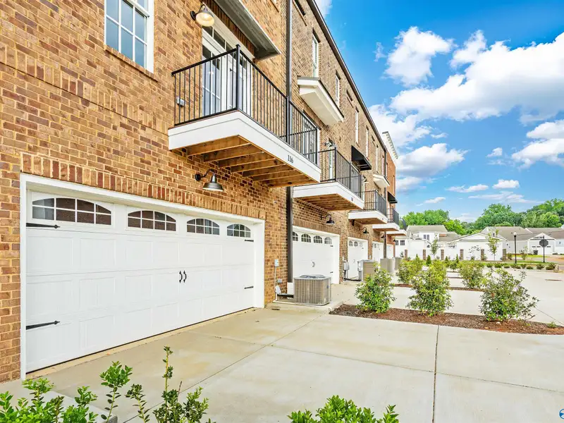 Live/work Townhome with Flex Space, Gourmet Kitchen, and 2-car Garage in Prime Location