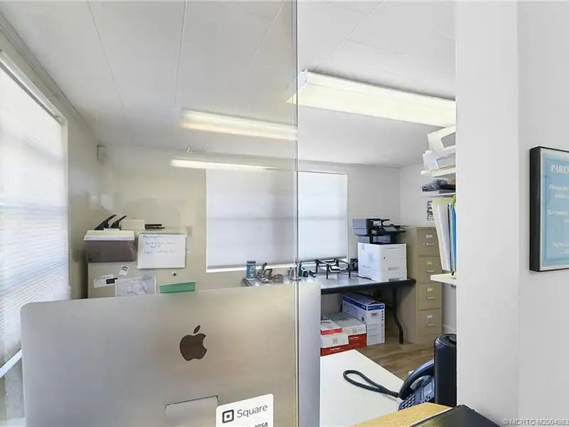 Versatile Office Building with Therapy Rooms and Break Area in R-3a Zoning