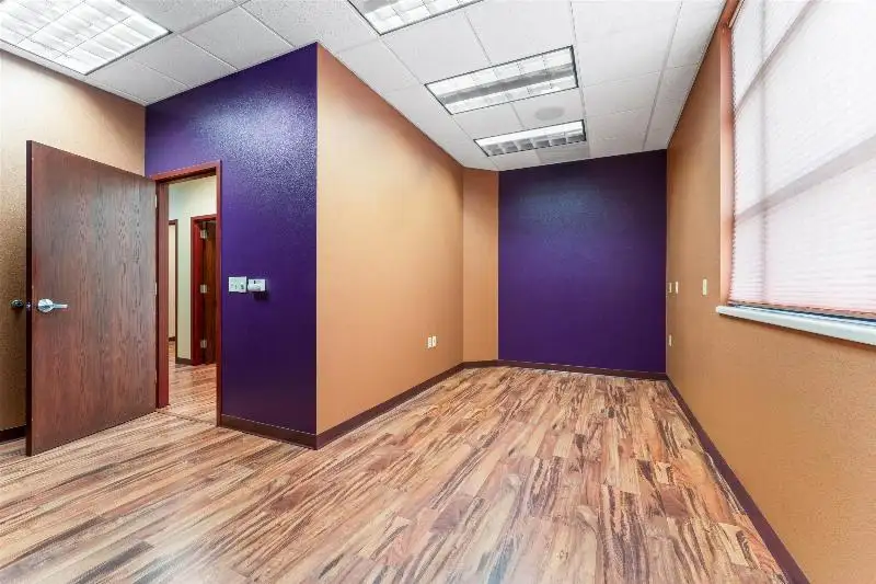 Versatile Commercial Condo for Sale Near Hwy 151 & 41 with Multiple Offices and Amenities