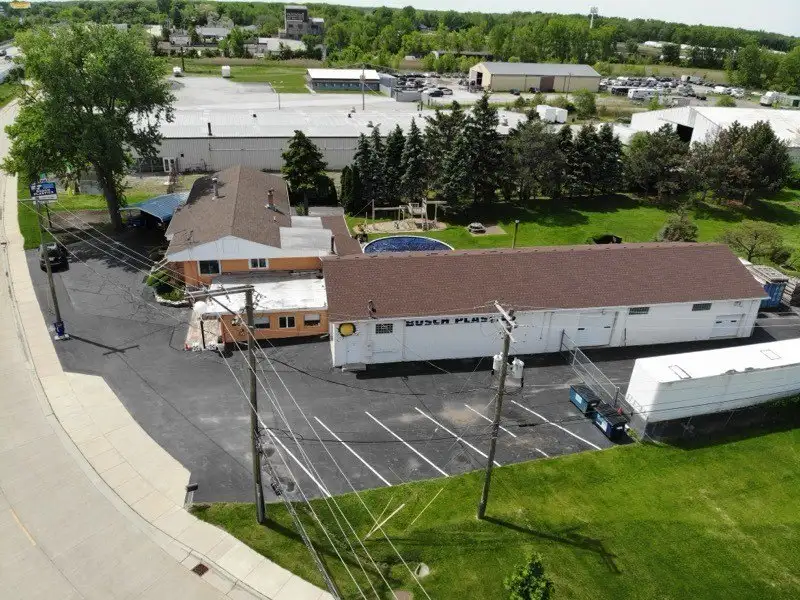 Turnkey Custom Plastics Manufacturing Business with Attached Home on 1.67 Acres