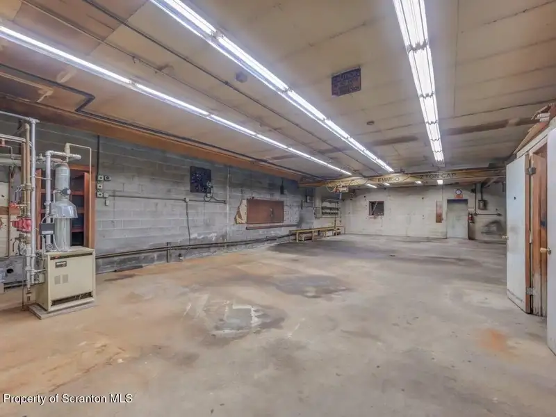 Mixed-use Property in Throop: 7-bay Garage and Updated 2-bedroom Apartment