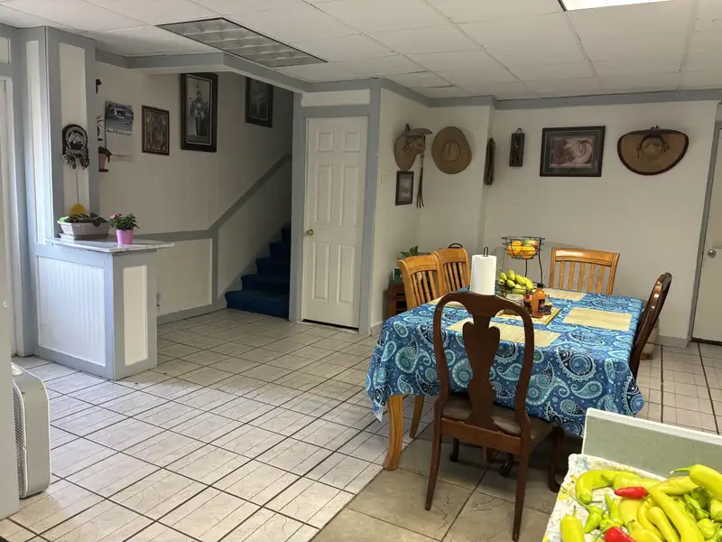 Mixed-use Property with 1-bedroom Apartment in Well-maintained Building
