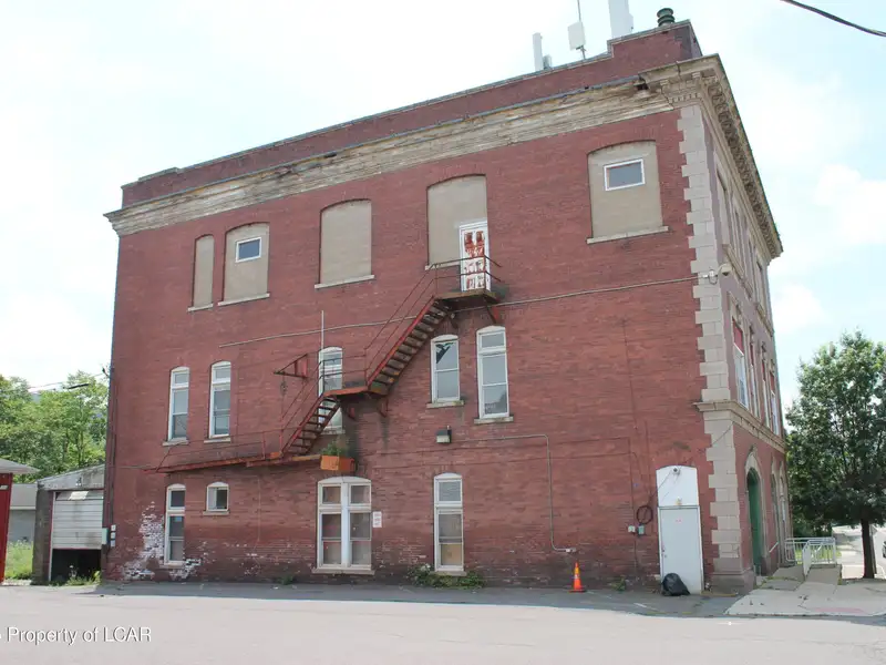 Former Municipal Building with Approved Plans for 12 or 15 Residential Units in Prime Location