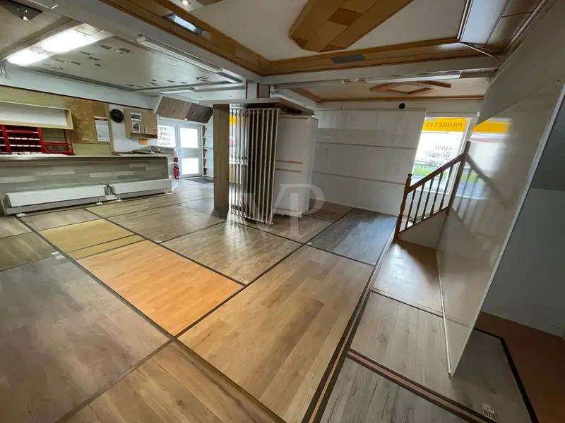 Mixed-use Property with Residential and Commercial Space in Prime Location