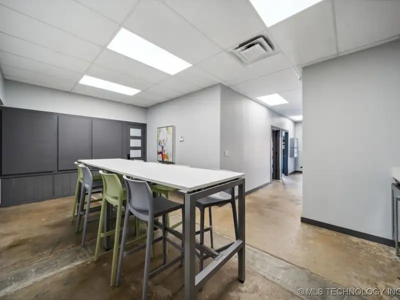Historic Office Building with 9 Private Suites and Conference Room in Prime Location