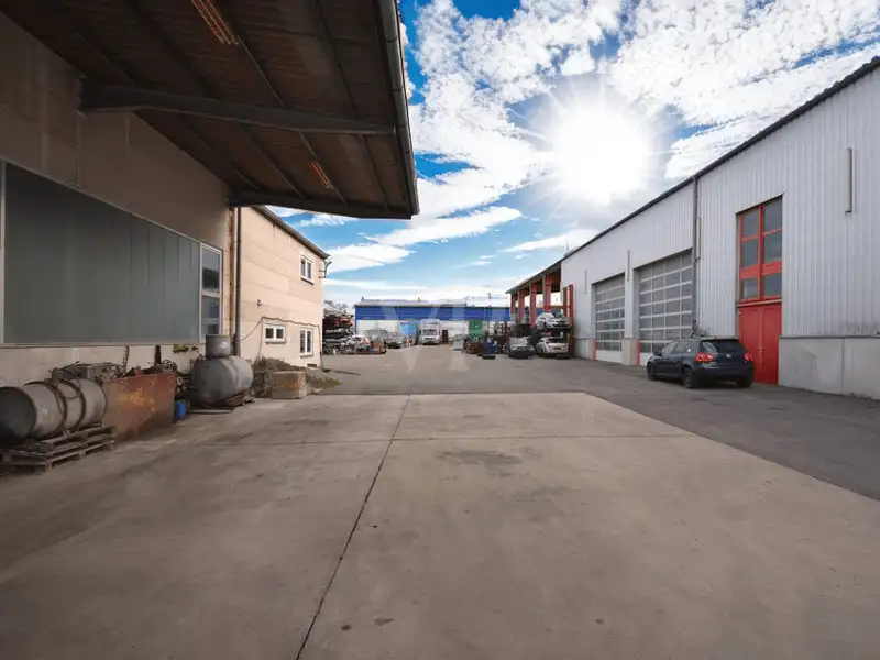 Versatile Industrial Property with Halls, Offices, and Open Space in Prime Location