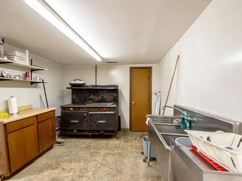 Office Space with Meeting Area, Kitchen, and Security Features in Convenient Location