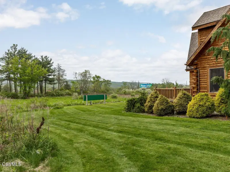 Commercial Log Home on 2 Acres with 3 Bedrooms and Scenic Views